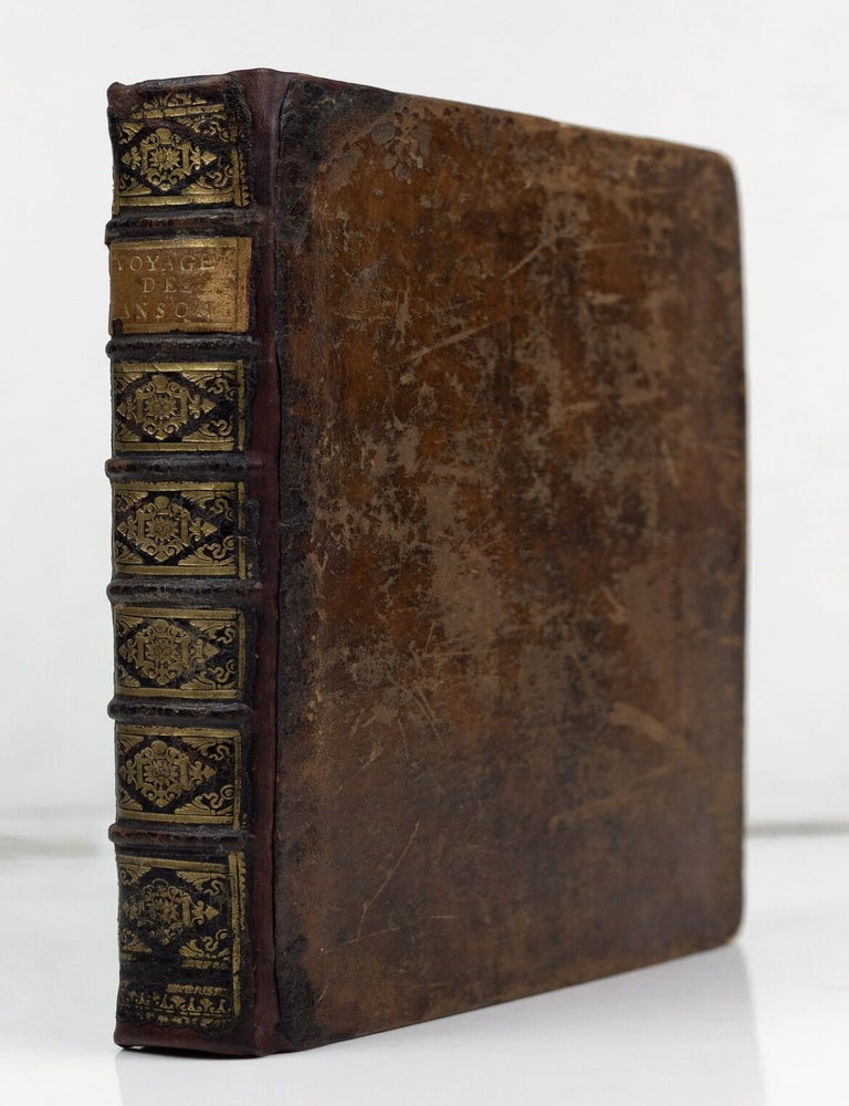 Item #GRM0028 Voyage autour du monde, fait dans les anne&rsquo;es MDCCXL,I,II,III,IV. Par George Anson, presentement Lord Anson, commandant en chef d&rsquo;une escadre envoye&rsquo;e par sa majeste&rsquo; Britannique dans la Mer du Sud. Tir&eacute; des Journaux & autres Papiers de ce Seigneur, & publi&eacute; par Richard Walter, Ma&icirc;tre &egrave;s arts & Chapelain du Centurion dans cette Exp&eacute;dition. Orn&eacute; de Cartes & de Figures en Taille douce. Traduit de Anglois. George Anson, Richard Walter.
