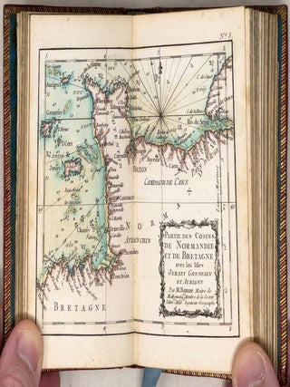 Atlas maritime ou Cartes reduites de toutes les C&ocirc;tes de France avec des Cartes particulieres des Isles voisines les plus considerables, suivies des plans des principales Villes Maritimes de ce royaume Par M. Bonne de la Societ&eacute; Litteraire Militaire M.tre de Mathem. Ingenieur G&eacute;ographe