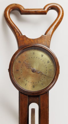 A brass and mahogany Waywiser, banded in iron