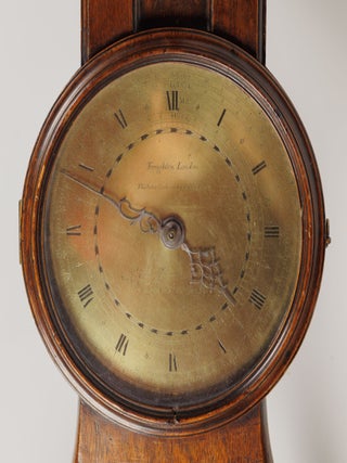 A brass and mahogany Waywiser, banded in iron